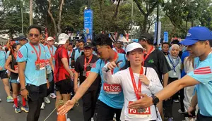 Ragam Kisah Jakarta Running Festival 2026: Dari Tongkat Bantu hingga Selempang Wisuda