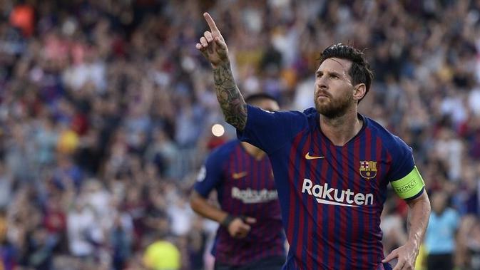 Striker Barcelona, Lionel Messi, merayakan gol ke gawang PSV Eindhoven pada laga Liga Champions, di Stadion Camp Nou, Selasa (18/9/2018). (AFP/Josep Lago)