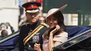 "Pernikahan mereka benar-benar jauh lebih baik dari apa yang dibayangkan Pangeran Harry. Ia jatuh cinta lebih dalam pada Meghan setiap harinya," ujar sumber. (NIKLAS HALLEN / AFP)