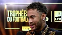 Presiden Paris Saint-Germain, Nasser Al-Khelaifi, berharap media-media Spanyol berhenti membuat rumor kepindahan Neymar ke Real Madrid karena sang pemain sudah gerah dengan hal tersebut. (AFP/Franck Fife)