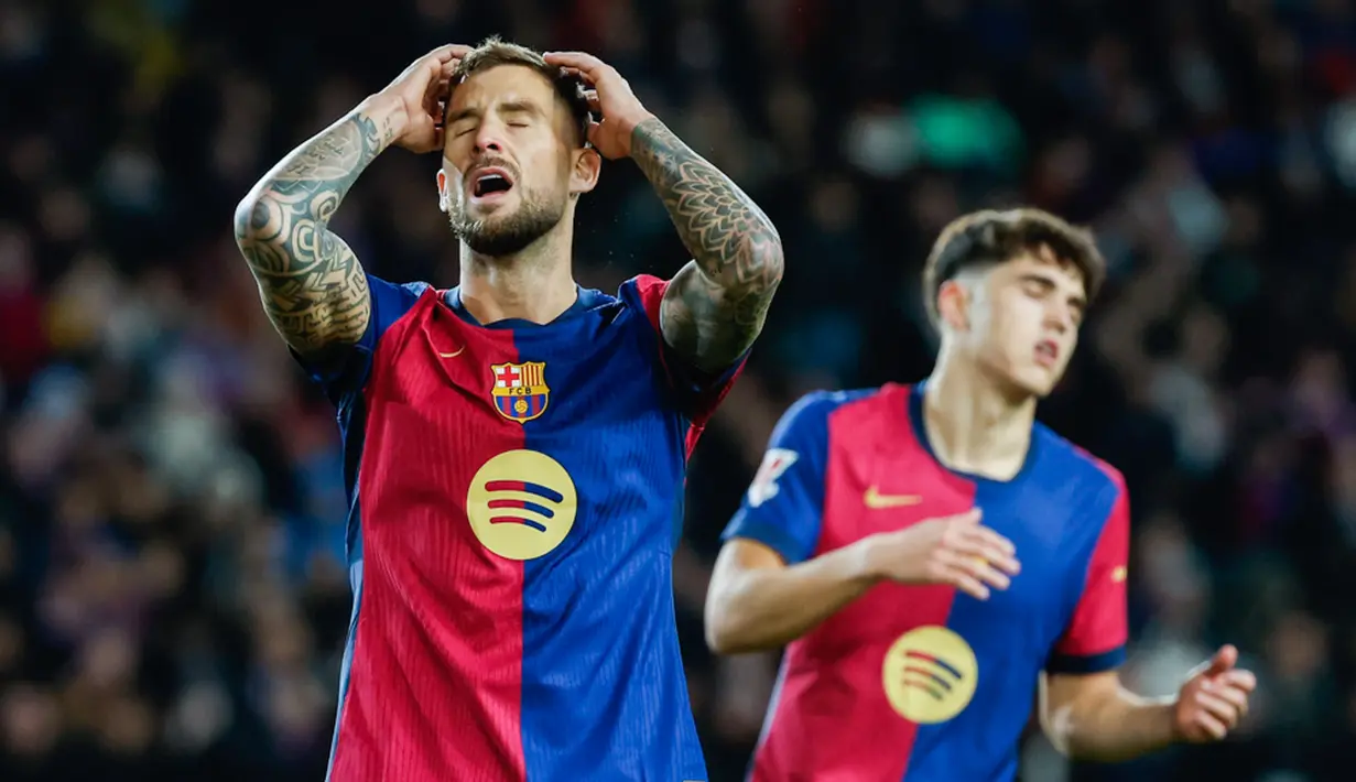 Hasil ini membuat Barcelona turun dari puncak klasemen. Punya 38 poin, Barcelona kini ada di bawah Atletico Madrid yang mampu mengumpulkan 41 poin. Sementara, Real Madrid ada di peringkat ke-3 dengan 37 poin. (AP Photo/Joan Monfort)