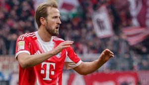Penyerang Bayern Munich asal Inggris bernomor punggung 09, Harry Kane, merayakan gol yang membuat skor menjadi 0-2 dalam pertandingan Bundesliga divisi pertama Jerman antara SV Werder Bremen dan FC Bayern Munich di Bremen, Jerman utara, 14 Februari 2026. (Focke Strangmann/AFP)