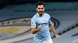 Pemain Manchester City, Ilkay Gundogan, melakukan selebrasi setelah mencetak gol ke gawang West Bromwich Albion pada laga Liga Inggris di Stadion Etihad, (15/12/2020). Kontrak Gundogan bersama City akan berakhir pada akhir musim ini. Memperkuat City sejak 2016, gelandang asal Jerman itu telah menorehkan 51 gol dan 35 assist dri 277 pertandingan di semua kompetisi bersama The Citizens. (Martin Rickett/POOL/AFP)