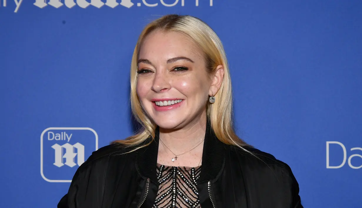Lindsay Lohan mengungkapkan bahwa kakinya baru saja digigit ular saat liburan di Thailand. (SLAVEN VLASIC  GETTY IMAGES NORTH AMERICA  AFP)