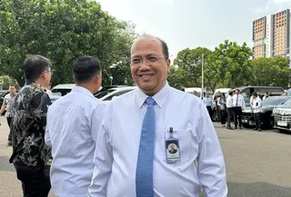 Direktur Utama PT Bank Mandiri, Riduan, tiba di Kompleks Istana Kepresidenan Jakarta. (Liputan6.com/Lizsa Egeham)