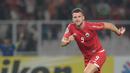 Gaya Marko Simic usai mecetak gol pertama ke gawang Tampines Rovers pada laga Piala AFC 2018 di Stadion Utama GBK, Senayan, Jakarta (28/2/2018). Simic mencetak tiga gol untuk Persija. (Bola.com/Nick Hanoatubun)