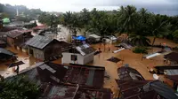 Banjir dan tanah longsor menerjang sebagian besar wilayah di Sulawesi Utara, sejak 25 hingga 27 Januari 2017. (Liputan6.com/Yoseph Ikanubun)