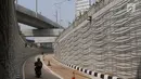 Kendaraan melintasi underpass Kartini di kawasan Lebak Bulus, Jakarta Selatan, Jumat (23/2). Satu lajur underpass tersebut telah mulai diuji coba untuk mengurai kemacetan di kawasan tersebut. (Liputan6.com/Immanuel Antonius)
