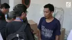 Para pekerja pabrik narkoba dikenal tertutup dan mengaku bekerja di sebuah tempat pembuatan jamu dan pil pegel linu.