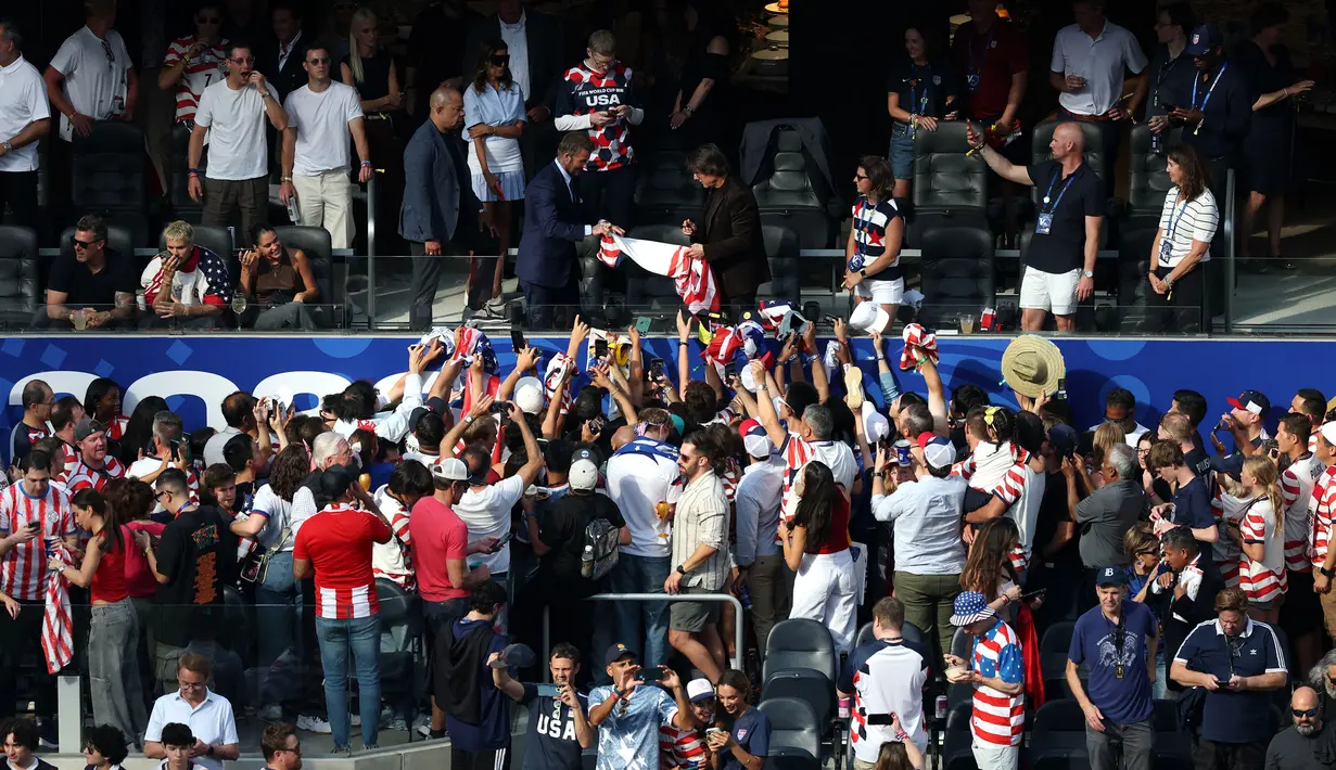 Kedatangan mereka berdua mengundang perhatian para penonton yang hadir di Los Angeles Stadium, Inglewood, Amerika Serikat, Sabtu (13/06/2026) dini hari WIB. (AFP/Getty Images/Harry How)