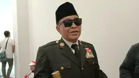 Teguh, pria bergaya ala Presiden Sukarno di acara kampanye akbar Jokowi-Ma'ruf di GBK, Jakarta. (Liputan6.com/ Ady Anugrahadi)