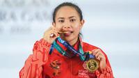 Ni Nengah Widiasih memecahkan rekor ASEAN Para Games (APG) atas namanya sendiri saat tampil di kelas 45kg putri cabang olahraga para-powerlifting ASEAN Para Games 2022 di Hotel Paragon Solo, Jawa Tengah, Senin (1/8/2022).  (NPC Indonesia)