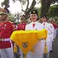 Paskibraka Nasional 2023 asal Sumatra Selatan (Sumsel) yang terpilih menjadi pembawa baki pada Upacara Penurunan Bendera Merah Putih di Istana Merdeka Jakarta. (Tangkapan Layar Youtube Sekretariat Presiden )