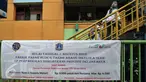 Spanduk pemberitahuan terpasang di PD Pasar Jaya Tanah Abang, Jakarta, Senin (1/8). Pemprov DKI melalui Badan Layanan Umum Daerah (BLUD) Perparkiran mengambil alih pengelolaan parkir 15 pasar PD Pasar Jaya. (Liputan6.com/Yoppy Renato)