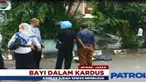 Petugas kebersihan ini tidak menduga jika kardus yang tercium bau menyengat itu adalah jasad bayi.