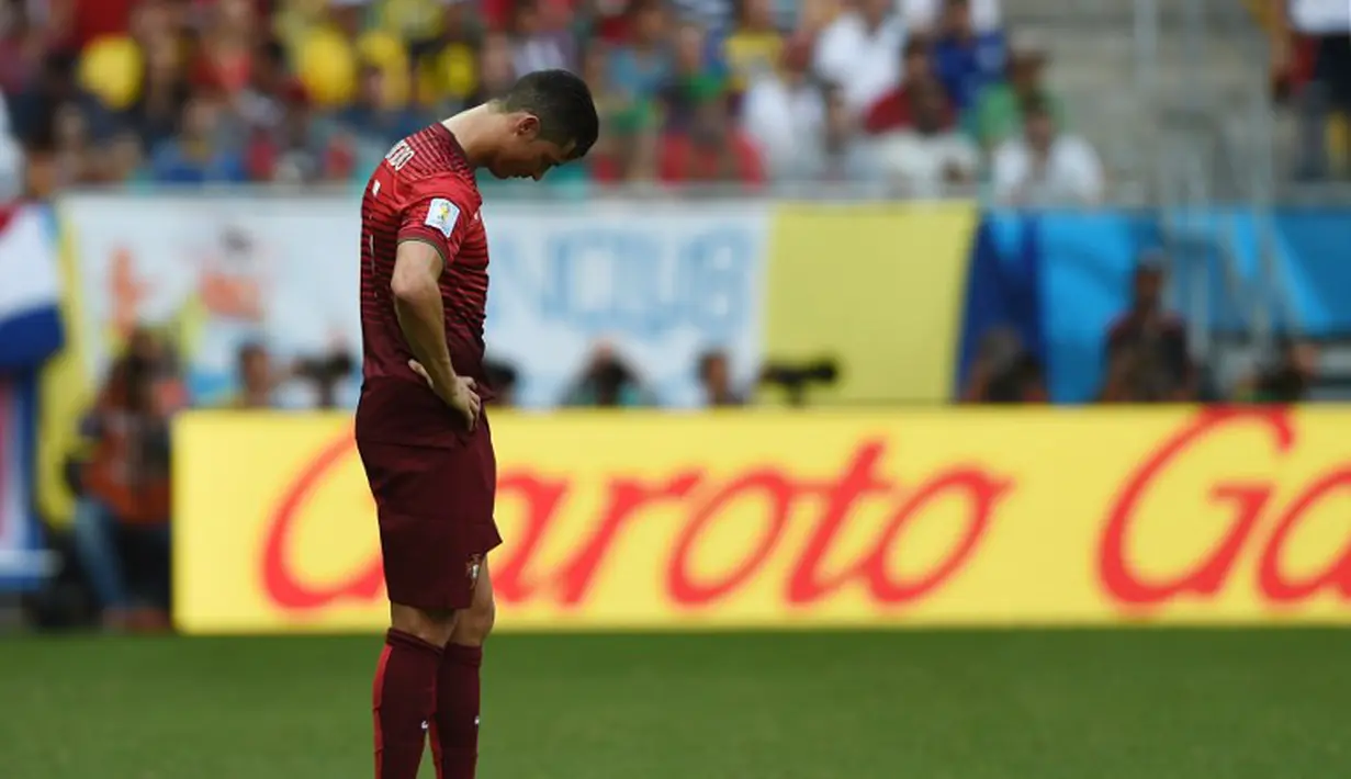 Bermain dengan 10 orang, penjagaan ketat, dan terlalu egois membuat CR7 tak berkutik di laga ini, Senin (16/6/2014) (AFP Photo/FRANCISCO LEONG)
