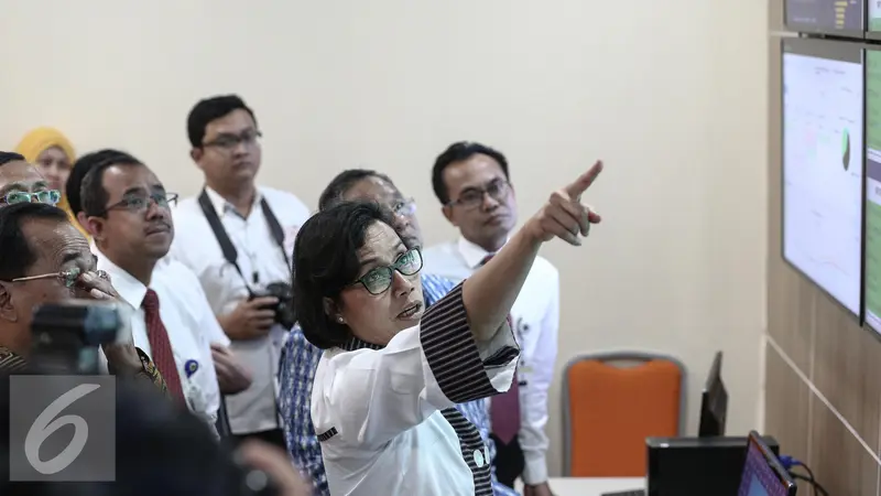 Menko Perekonomian Darmin Nasution, Menteri Keuangan Sri Mulyani, Menteri Perhubungan Darmin NasutionDarmin Nasution