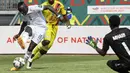 Senegal mengawali kiprahnya di Piala Afrika 2021 dengan kemenangan dramatis 1-0 atas Zimbabwe. Bomber Liverpool, Sadio Mane, menjadi pahlawan lewat gol penalti di pengujung laga. (AFP/Pius Utomi Ekpei)