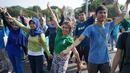 Peserta mengikuti flashmob dalam Pawai Tolak Plastik Sekali Pakai di Lapangan Aspirasi Monas, Jakarta, Minggu (21/7/2019). Pawai bebas plastik ini akan menjadi aksi terbesar di Indonesia untuk menolak penggunaan plastik sekali pakai karena sudah mengancam lingkungan. (Liputan6.com/Immanuel Antonius)