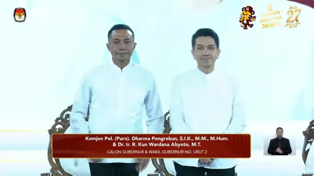 Paslon Pilkada Jakarta 2024 nomor urut 2 Dharma Pongrekun-Kun Wardana dalam debat perdana Pilkada Jakarta 2024, Minggu (6/10/2024) di JIExpo Kemayoran, Jakarta Pusat.