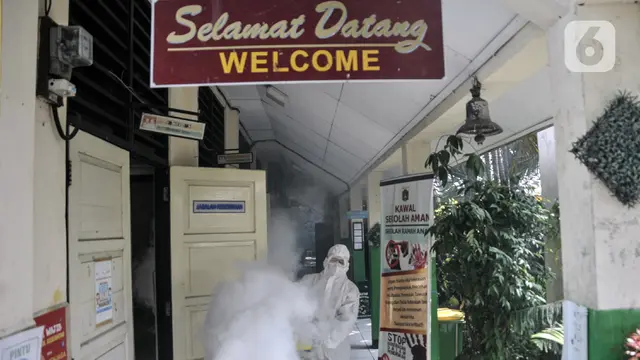 FOTO: Evaluasi PTM 100 Persen di Jakarta