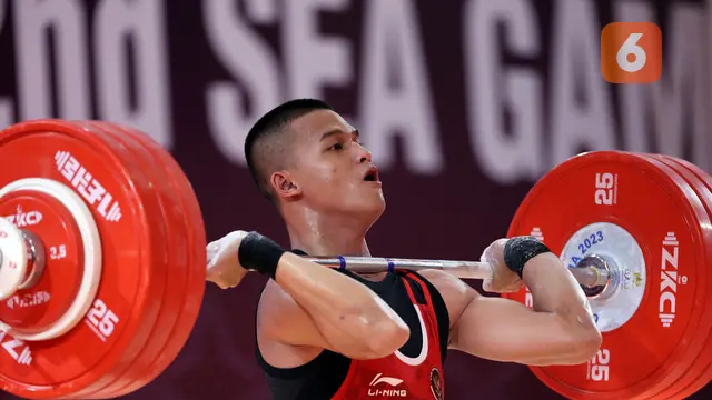 Foto: Otot Kuat Rizki Juniansyah Tambah Medali Emas untuk Indonesia dari Angkat Besi SEA Games 2023