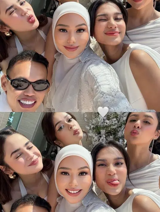 Azizah memilih gaun tanpa lengan dengan potongan mermaid yang mempertegas bentuk tubuhnya. Tampilan ini memberi kesan glamor namun tetap elegan.