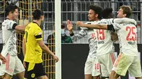 Bayern Munchen meraih kemenangan 3-1 atas Borussia Dortmund pada laga Piala Super Jerman 2021 di Signal Iduna Park, Rabu (18/8/2021) dini hari WIB. Hasil itu membuat Bayern berhak atas trofi Piala Super Jerman. (AFP/Ina Fassbender)