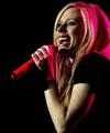 Avril Lavigne, akhir-akhir ini tak pernah menampakan diri di hadapan publik. Tidak hanya soal kisah cintanya pasca bercerai di tahun 2015 lalu, namun juga kiprahnya di dunia musik. (AFP/CESAR VICUÑA)