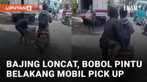 VIDEO: Bobol Pintu Belakang Mobil Pick Up, Bajing Loncat Curi Barang Didalamnya