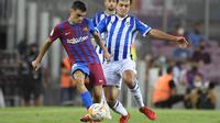 Pedri merupkan pemain muda berbakat Barcelona yang menempati urutan kedua pemain berbanderol tertinggi, yaitu 80 juta euro. Namun bisa saja ia bernasib sama dengan sang bintang Barcelona, Lionel Messi yang tidak diperpanjang oleh klub dan meninggalkan Blaugrana secara gratis. (Foto: AFP/Josep Lago)