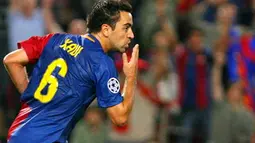 Barcelona&#039;s Xavi Hernandez celebrates his goal during their UEFA Cup Champions League football match against Sporting Lisboa at the New Camp stadium in Barcelona, on September 16, 2008. AFP PHOTO/JOSEP LAGO. 