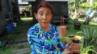 Susi Pudjiastuti berkebun setelah dua bulan badannya naik dua kilogram (Dok.Instagram/@susipudjiastuti115/https://www.instagram.com/p/B_4iSD5Hrhy/Komarudin)