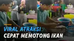 Dengan cepat ia memotong dan membedah satu per satu ikan.