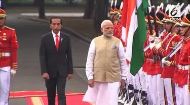 Presiden Joko Widodo atau Jokowi menyambut kedatangan Perdana Menteri India, Narendra Modi, di Istana Merdeka, Jakarta, Rabu (30/5/2018).