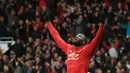 Pemain Manchester United, Romelu Lukaku membuka keunggulan timnya dengan gol cepat pada menit ke-5’ saat melawan Swansea City pada lanjutan Premier League di Old Trafford, Manchester, (31/3/2018). MU menang dengan skor 2-0. (AFP/Lindsey Parnaby)