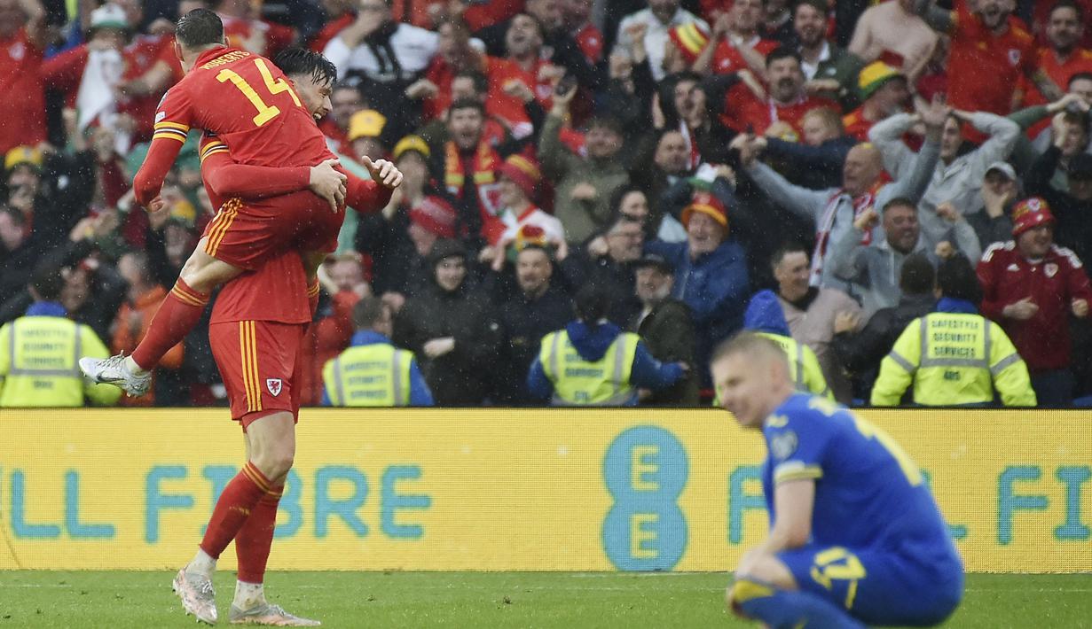 Kepastian itu didapat Wales usai menaklukkan Ukraina pada laga final Path A Playoff Piala Dunia 2022 Zona Eropa. (AP/Rui Vieira)