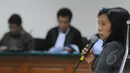 Seorang saksi memberikan keterangan saat sidang lanjutan kasus dugaan suap alih fungsi lahan hutan di Bogor, Pengadilan Tipikor, Jakarta, Senin (30/3/2015). (Liputan6.com/Herman Zakharia)