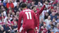 Pemain Liverpool, Dominik Szoboszlai, merayakan gol pertamanya untuk timnya dalam pertandingan Liga Primer Inggris antara FC Liverpool dan FC Arsenal di Liverpool, Inggris, Minggu (31/8/2025). (Foto AP/Jon Super)