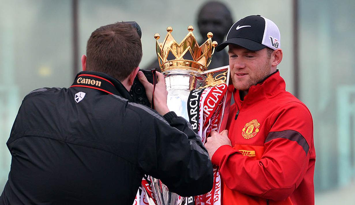 Pesepak bola Inggris itu juga sudah memberikan Setan Merah gelar Liga Premier Inggris sebanyak lima kali dan Liga Champions satu kali pada musim 2007/2008. (AFP Photo/Paul Ellis)