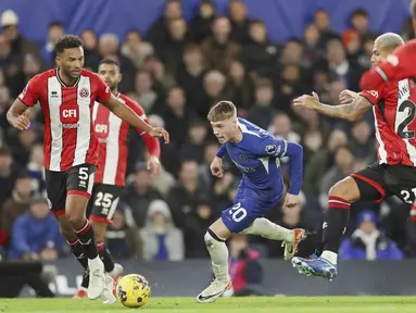 Cole Palmer menunjukkan penampilan gemilang di babak kedua. Gelandang muda Inggris itu menjadi bintang di laga ini dengan menyumbang gol dan assist. (AP Photo/Ian Walton)