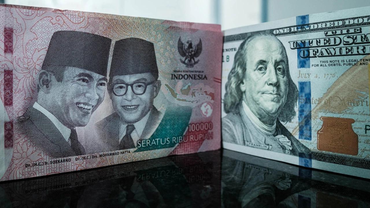 FOTO: Rupiah Tembus Rp 18000 per Dolar AS di Tengah Tekanan Global