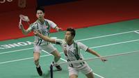 Aksi Kevin Sanjaya Sukamuljo/Marcus Fernaldi Gideon di Indonesia Masters 2022. (Bola.com/Ikhwan Yanuar Harun)