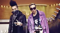 G-Dragon mengucapkan selamat kepada Taeyang yang berghasil memboyong banyak penghargaan di MAMA 2014.