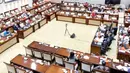 Suasana rapat kerja antara Menteri Keuangan Sri Mulyani Indrawati bersama Wakil Menteri Keuangan Suahasil Nazara dengan Komisi XI DPR di Jakarta, Rabu (19/1/2022). Rapat terkait evaluasi APBN tahun 2021 dan Pemulihan Ekonomi Nasional (PEN) 2021 serta rencana PEN 2022. (Liputan6.com/Angga Yuniar)