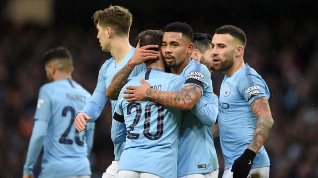 Manchester City menang 5-0 atas Burnley pada laga putaran keempat Piala FA, di Stadion Etihad, Sabtu (26/1/2019). (AFP/Oli Scarff)