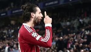 Gelandang Liverpool, Dominik Szoboszlai, berselebrasi setelah mencetak gol ke gawang Marseille dalam laga matchday ketujuh Liga Champions 2025/2026, Kamis (22/1/2026) dini hari WIB. (Thibaud MORITZ / AFP)