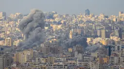 Israel berdalih bahwa serangan ke wilayah Beirut selatan, Lebanon ini mengincar sejumlah infrastruktur Hizbullah. (Foto oleh AFP)