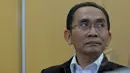 Wakil Ketua KPK Adnan Pandu Pradja saat konferensi pers di Gedung KPK, Jakarta, Jumat (20/2). Pimpinan baru KPK akan mengubah pembagian kerja di internal lembaga penegak hukum tersebut. (Liputan6.com/Andrian M Tunay)