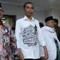 Pasangan Capres-cawapres, Joko Widodo dan Ma'ruf Amin tiba di gedung KPU untuk melakukan pendaftaran di Jakarta, Jumat (10/8). Pasangan Jokowi-Ma'ruf Amin mendaftarkan diri sebagai capres-cawapres di Pilpres 2019. (Liputan6.com/Helmi Fithriansyah)